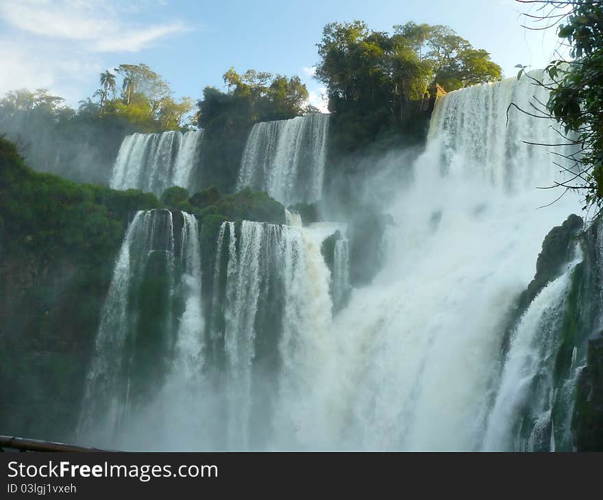 Iguazu Falls - a complex of waterfalls on the Iguazu River located on the border of Brazil and Argentina, has a width of 2.7 km and includes approximately 270 separate waterfalls. Height of drop of water reaches 82 meters. Iguazu Falls - a complex of waterfalls on the Iguazu River located on the border of Brazil and Argentina, has a width of 2.7 km and includes approximately 270 separate waterfalls. Height of drop of water reaches 82 meters.