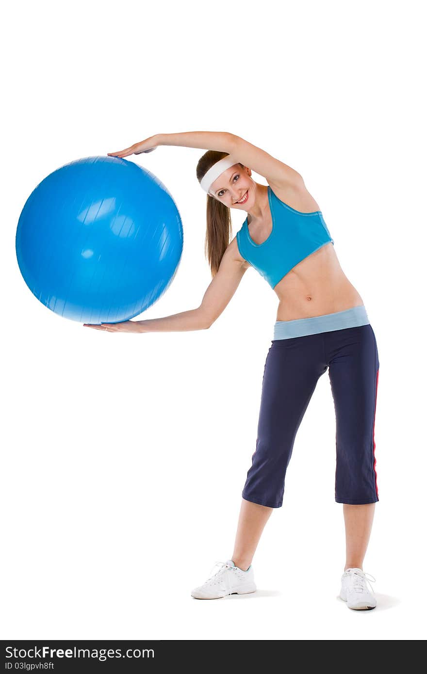 Portrait of strong girl lifting fitball on a white background. Portrait of strong girl lifting fitball on a white background