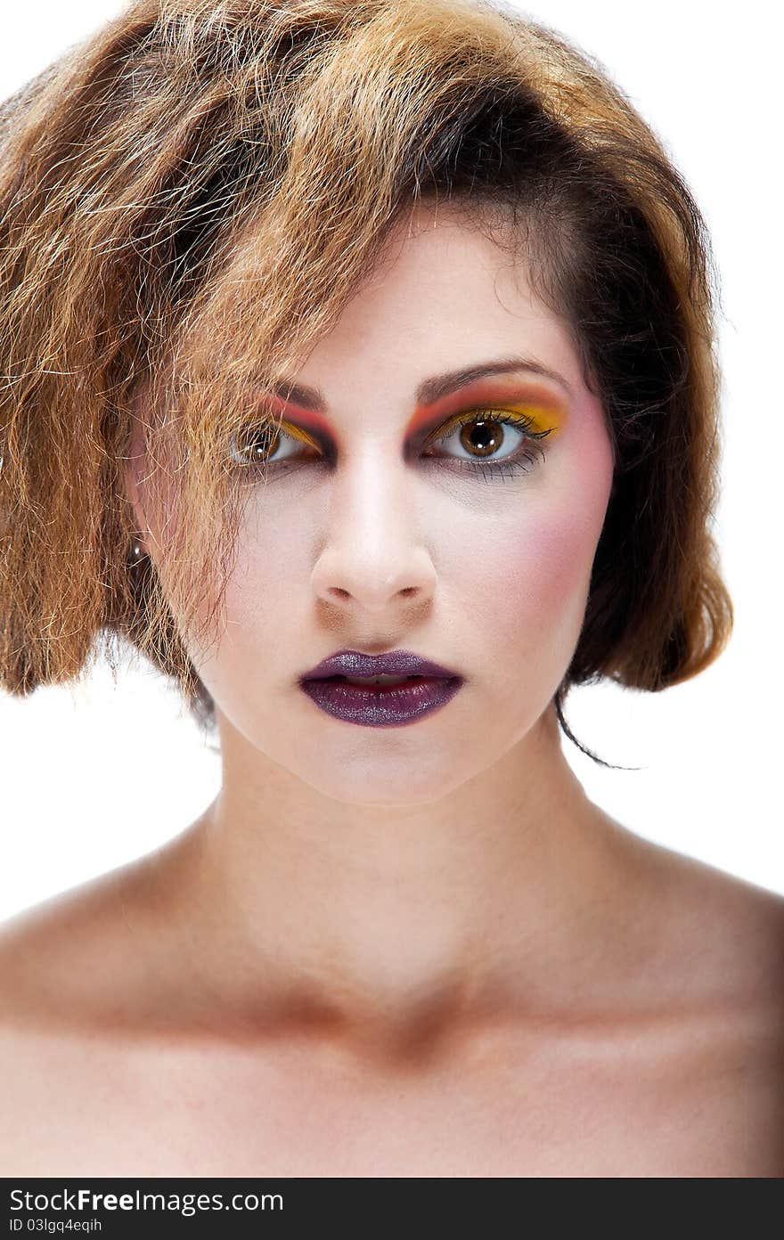 Female against white with colourful make up