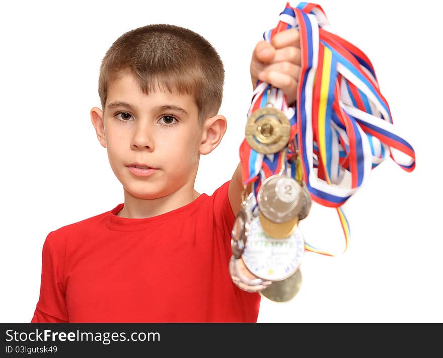 Boy-athlete with medals. Isolated on white background.