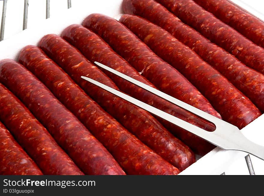 To illustrate the raw sausages grilled summer. To illustrate the raw sausages grilled summer