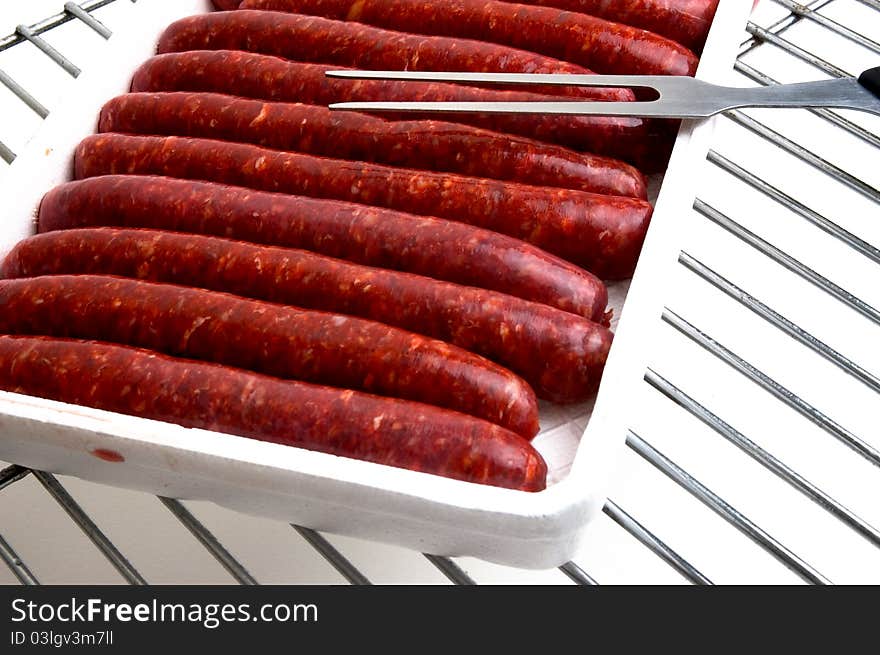 To illustrate the raw sausages grilled summer. To illustrate the raw sausages grilled summer