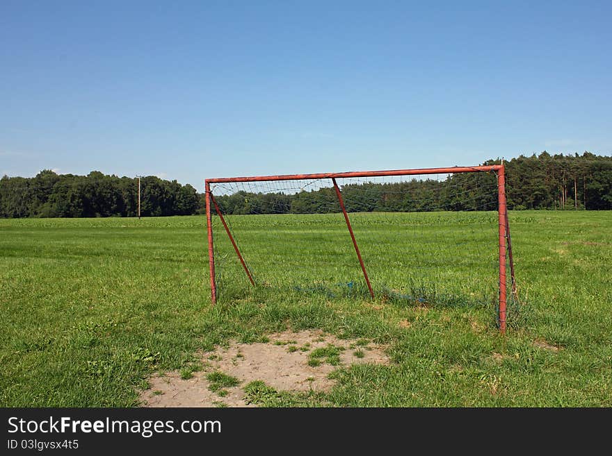 A football goal placed on a meadow for the kids to play