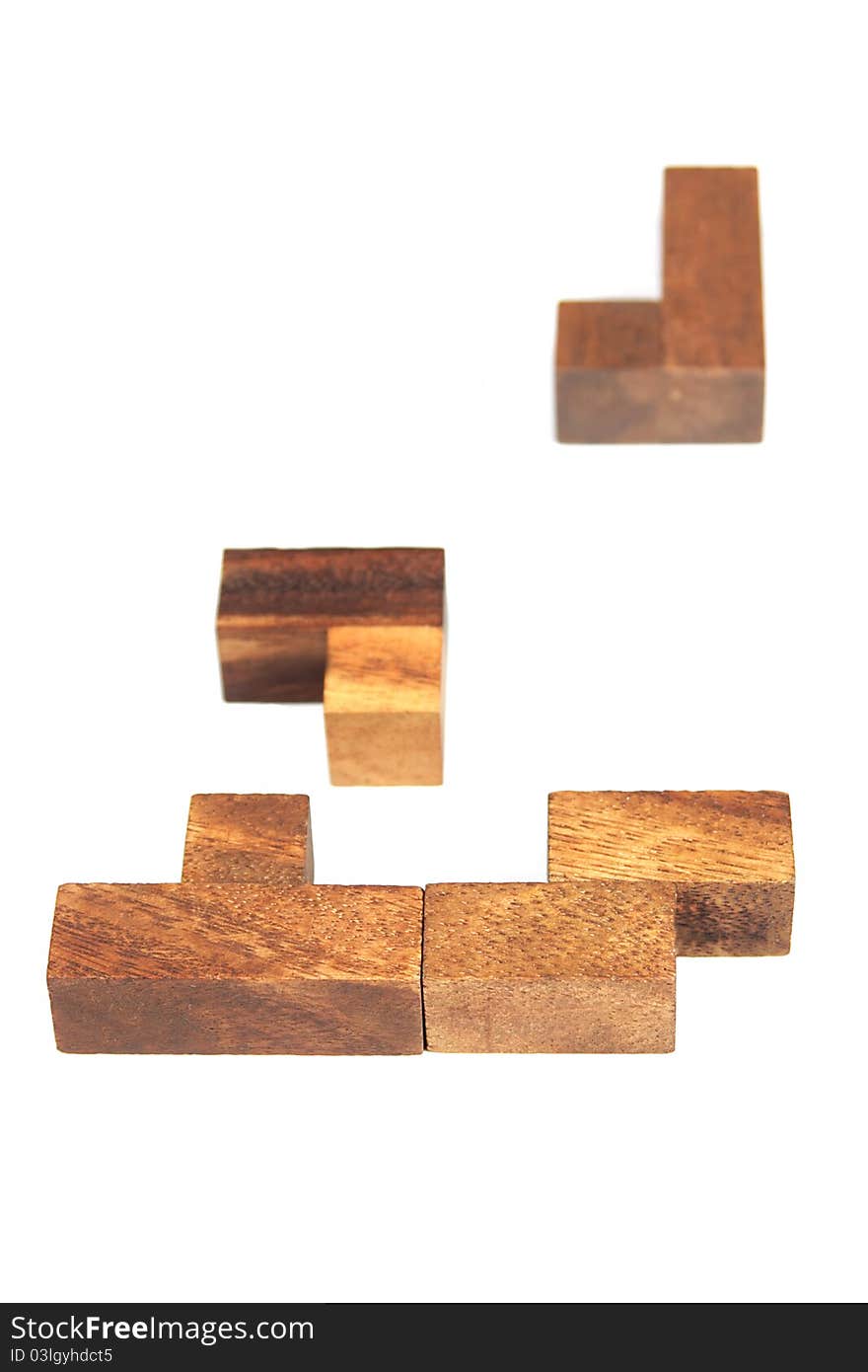 Wooden tetris puzzle isolated