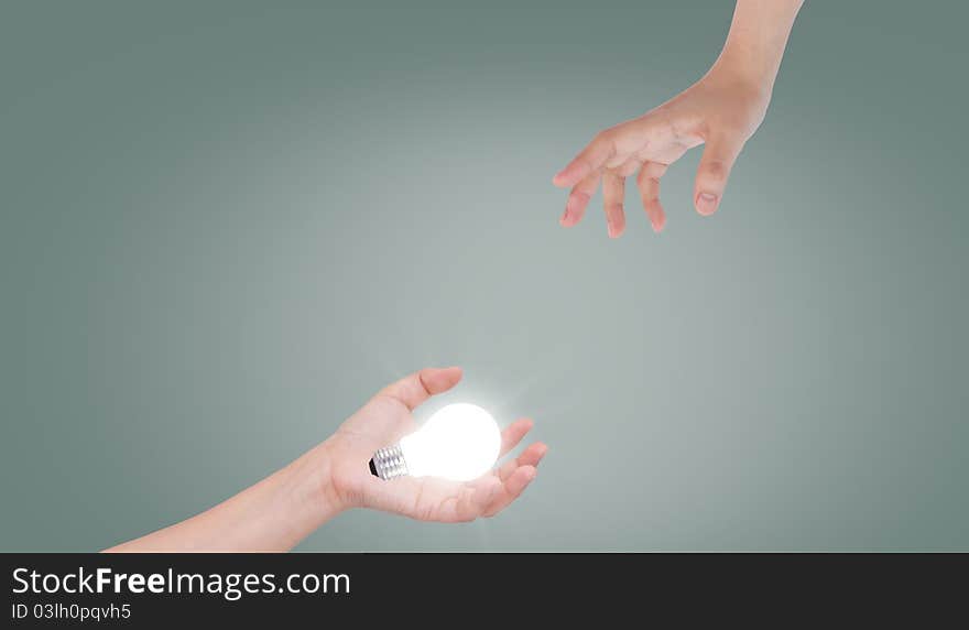 Light bulb on hand.