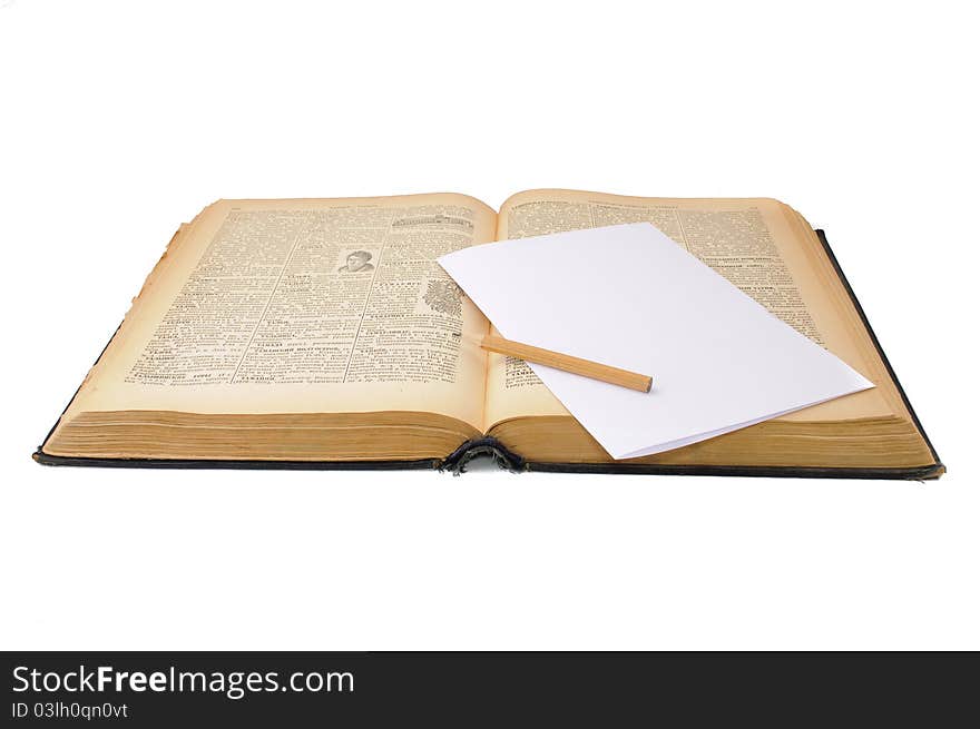 The oldest book and pencil. Isolated on white background