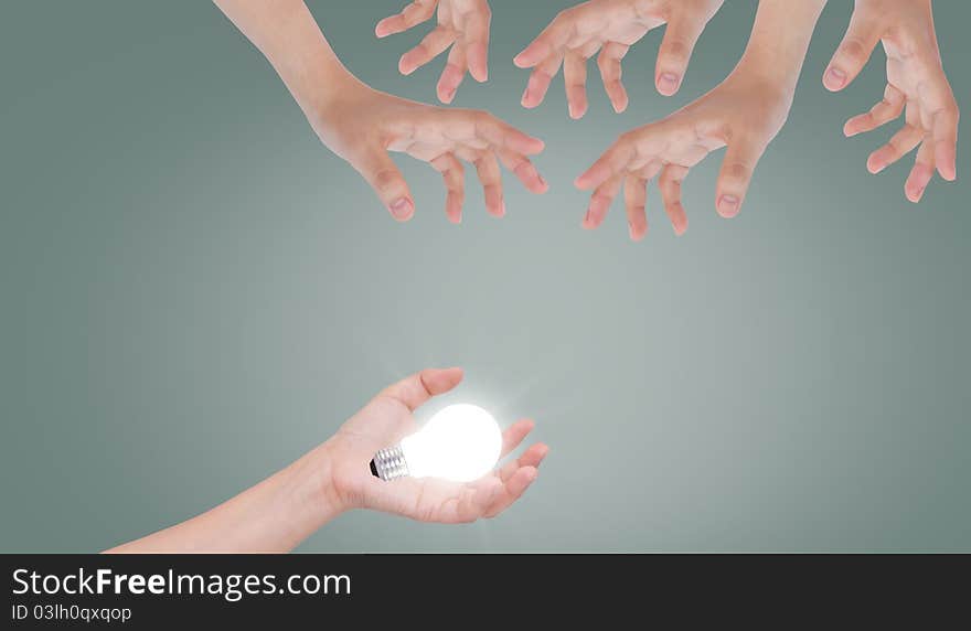 Light bulb on hand.