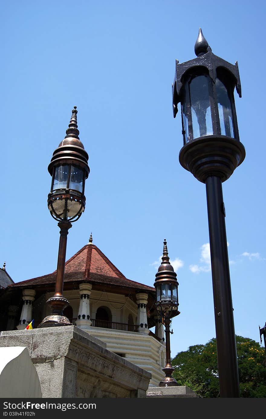 The sacred temple of tooth relic Kandy, Sri Lanka. The Temple of the Sacred Tooth Relic is a Buddhist temple in the city of Kandy, Sri Lanka. It is located in the royal palace complex which houses the Relic of the tooth of Buddha. Since ancient times, the relic has played an important role in local politics because it is believed that whoever holds the relic holds the governance of the country. Kandy was the last capital of the Sinhalese kings and is a UNESCO world heritage site partly due to the temple.