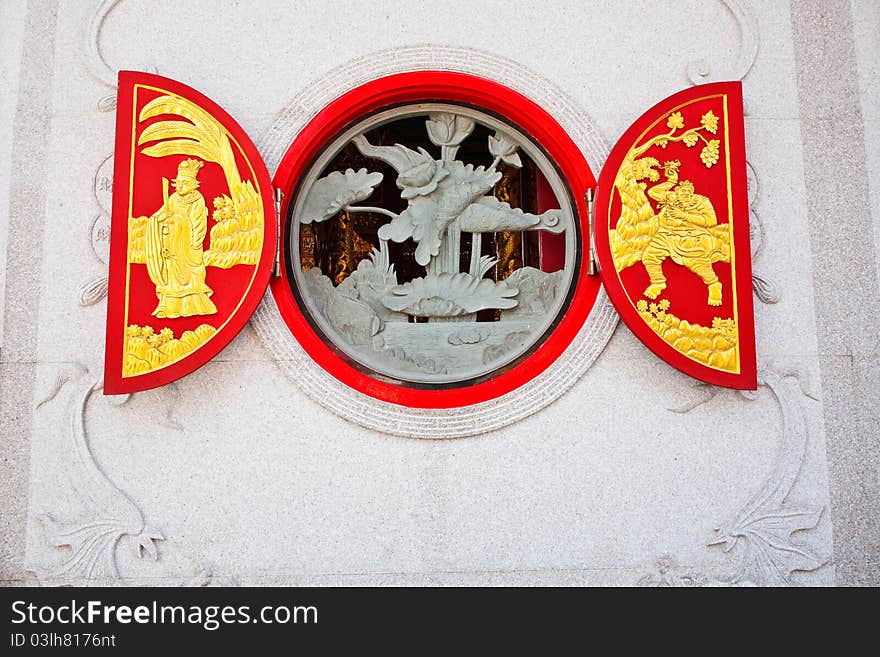 Native chinese sculpture on concrete window