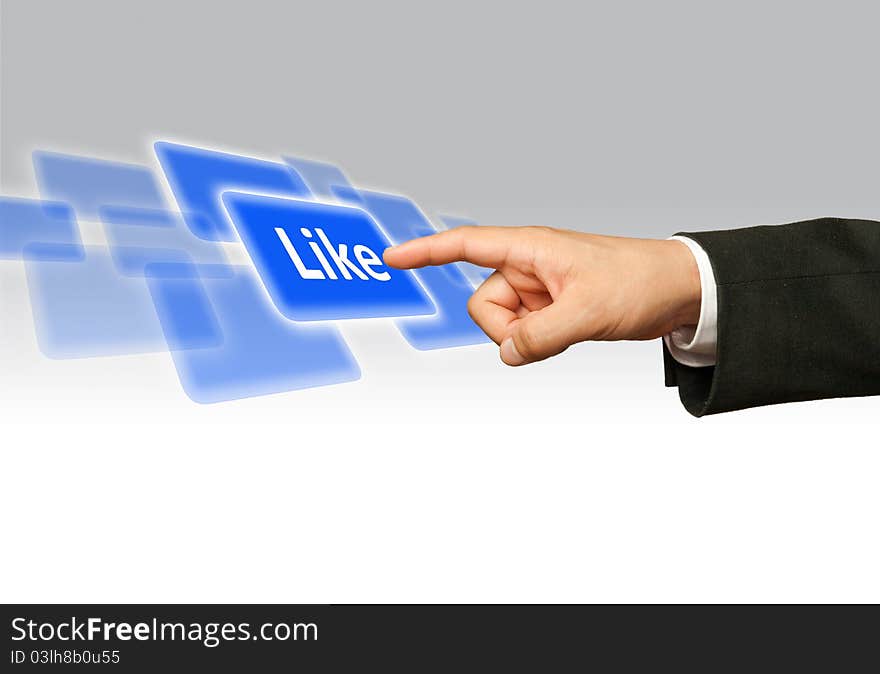 Finger of businessman pessing likeblue button. Finger of businessman pessing likeblue button.