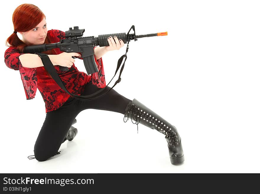 Young woman aiming Pellet Air Rifle over white background.