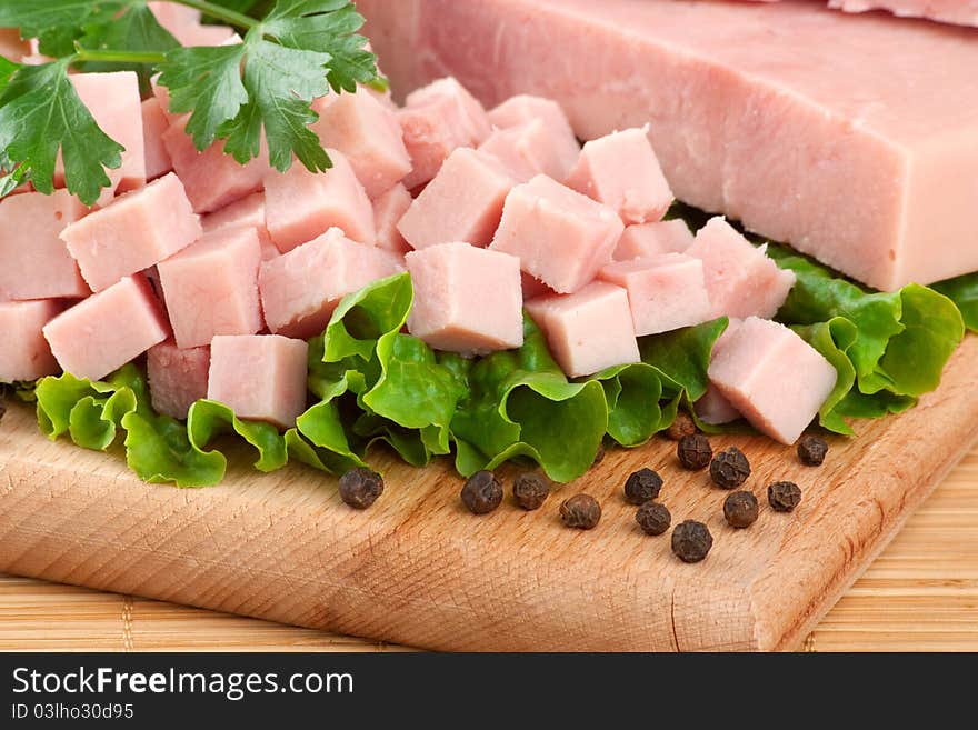 Pork  Ham Arranged On Cutting Board With Parsley A