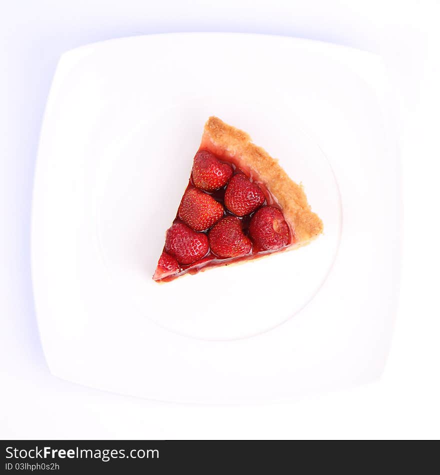 Strawberry Tart portion on a white background