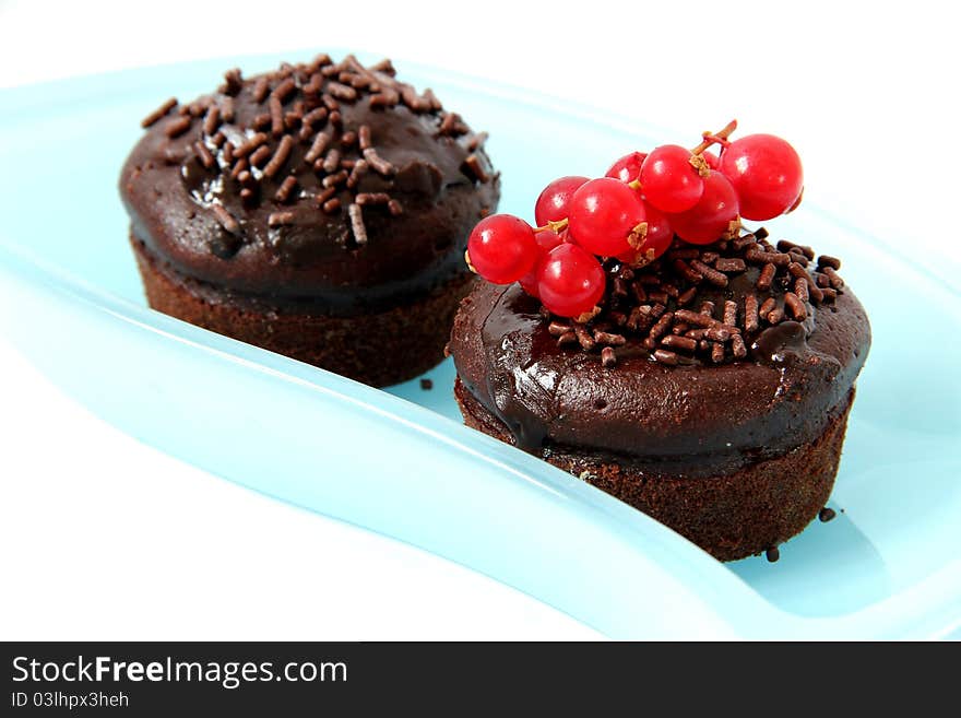 Chocolate cupcake on white background