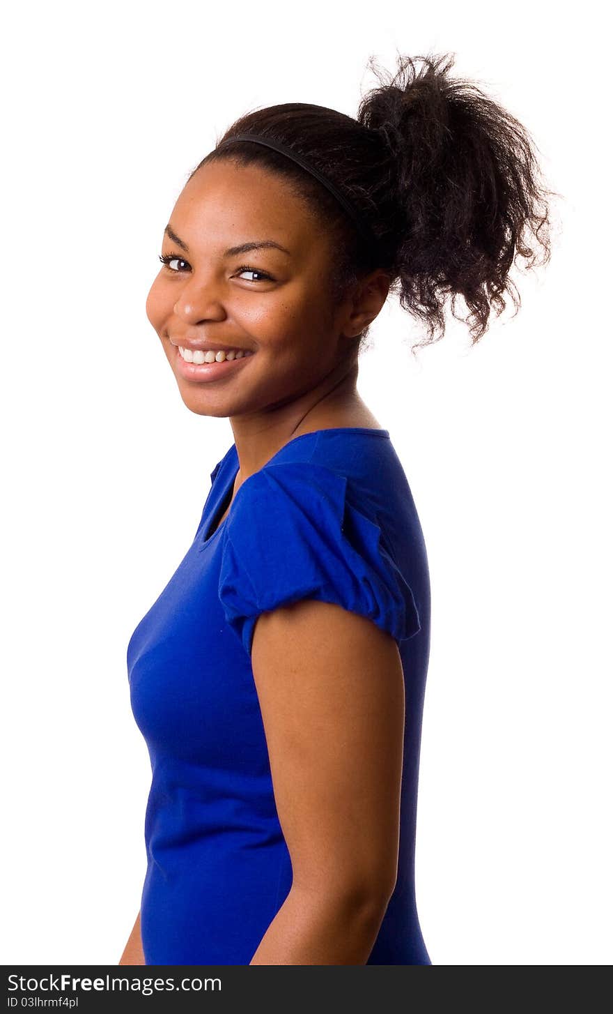 A young woman smiling isolated on a white background. A young woman smiling isolated on a white background.