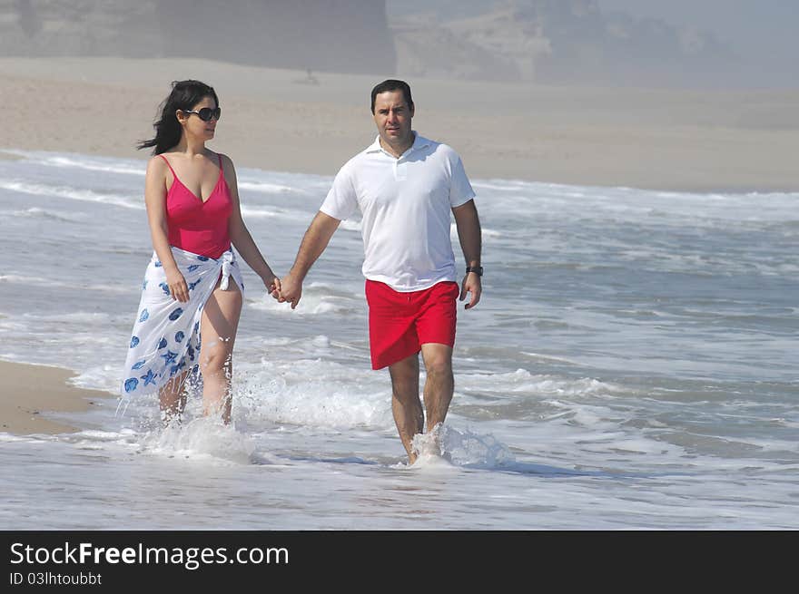 Portrait of a lovely romantic couple on the beach