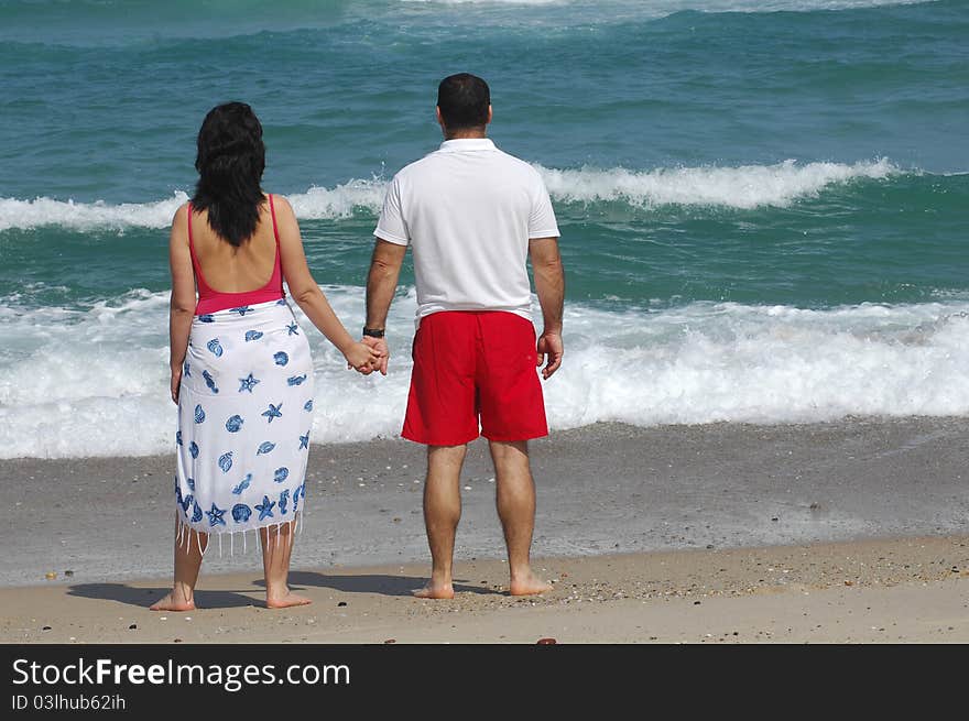 Portrait of a lovely romantic couple on the beach