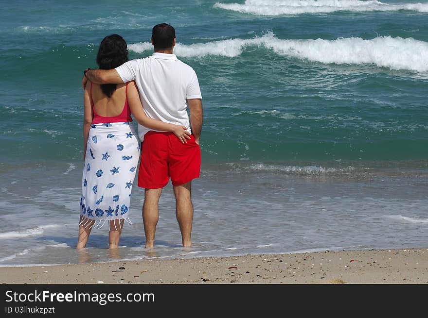 Portrait of a lovely romantic couple on the beach