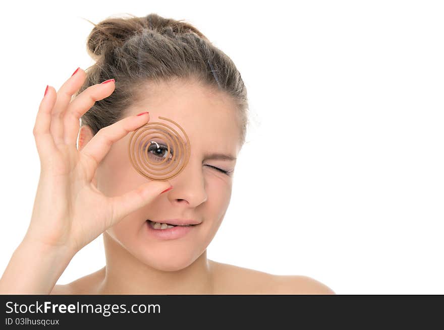 Young woman holds spiral aromas  isolated in white