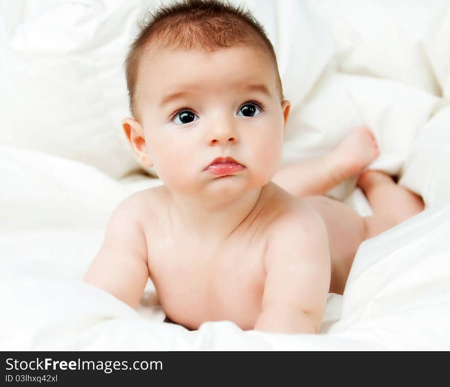 Closeup Portrait Of Cute Smiling Baby Boy