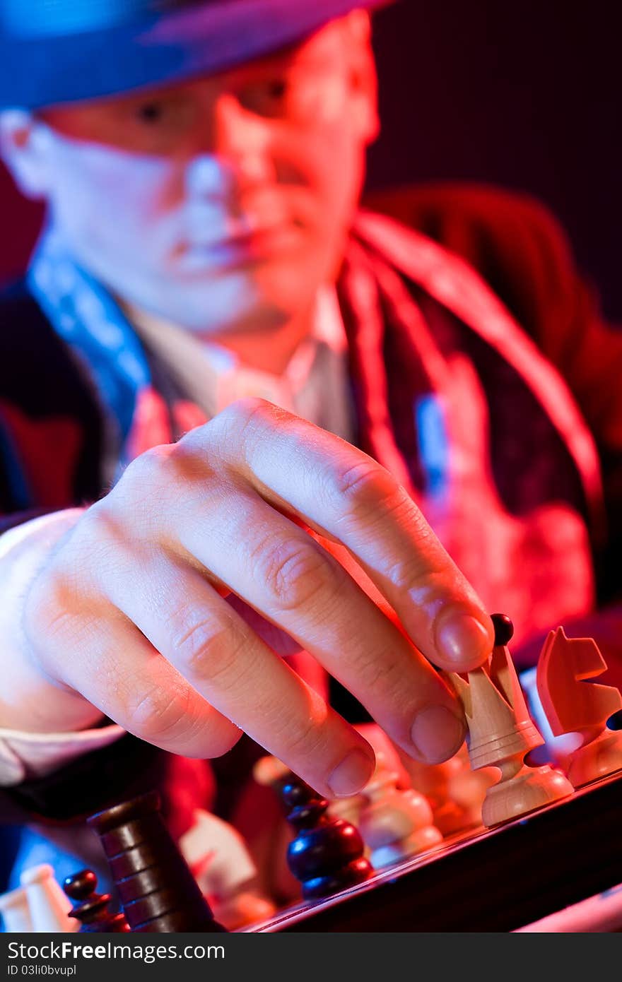 Man playing chess in a bar. Man playing chess in a bar.