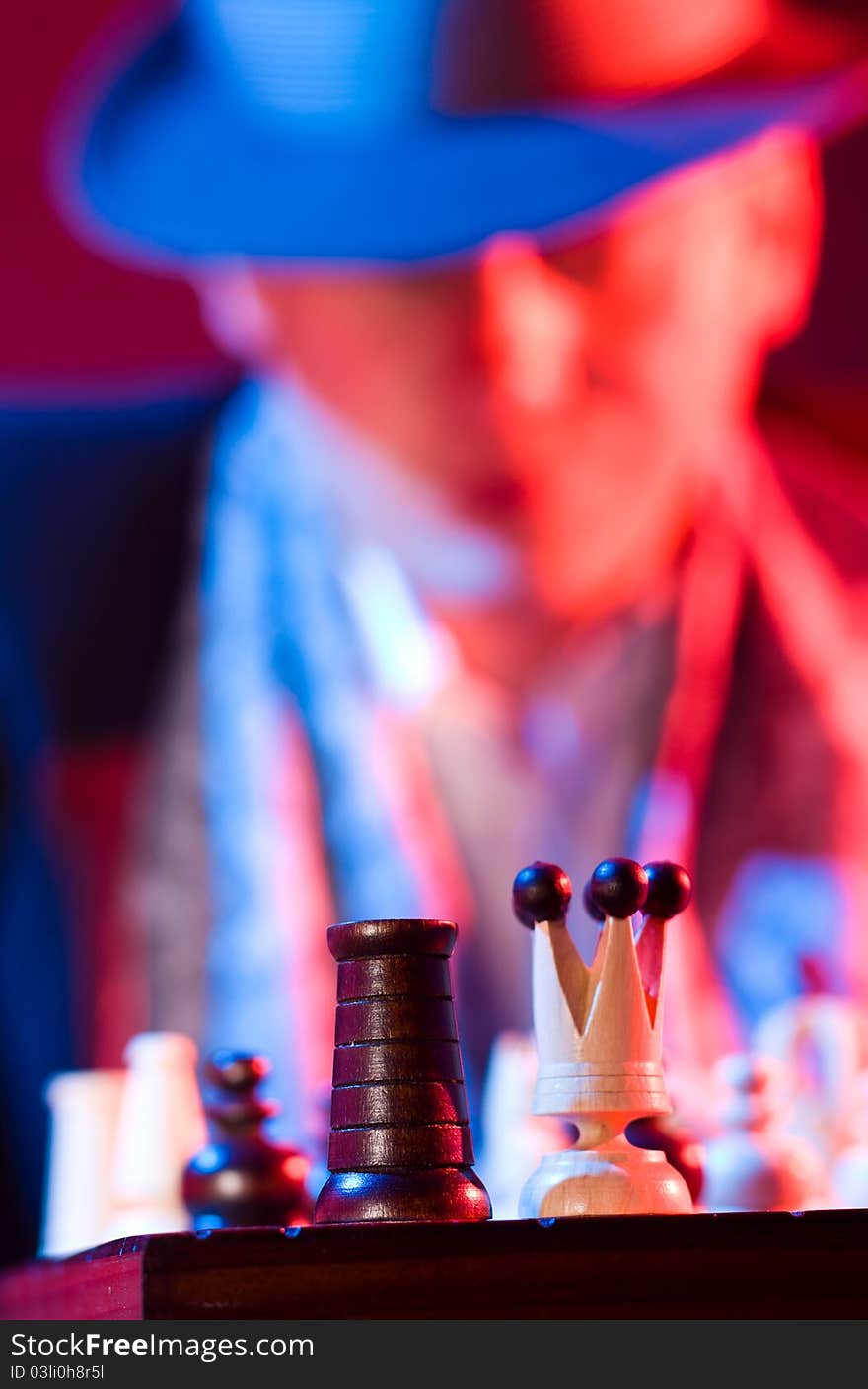 Man playing chess in a bar. Man playing chess in a bar.