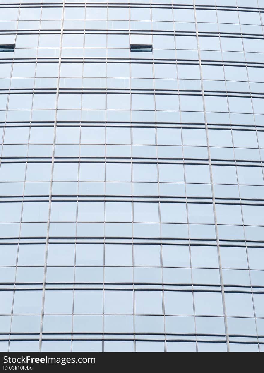 Silver office building glass wall in shenzhen, china.