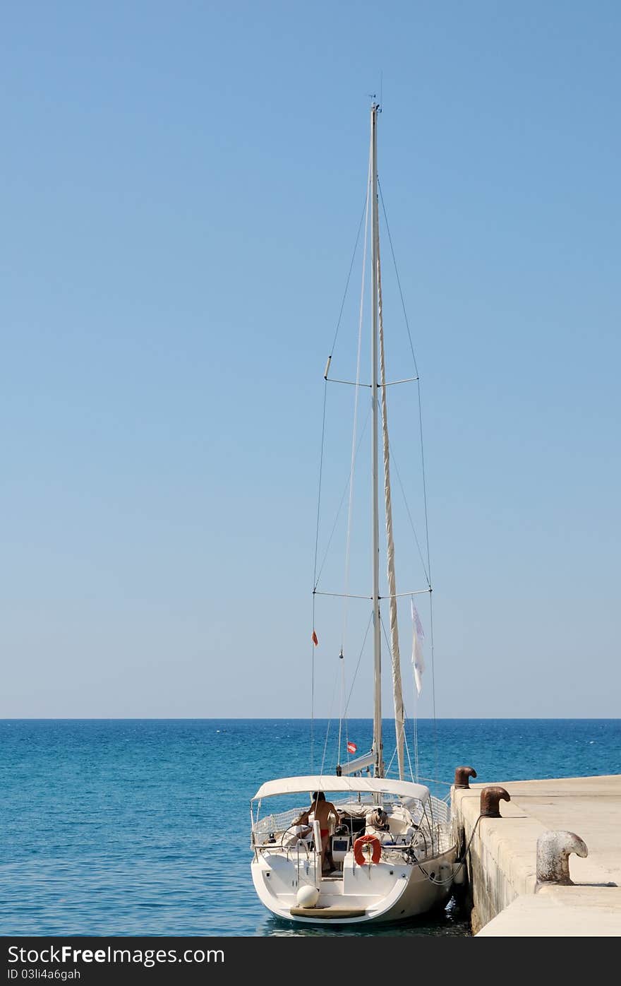 Sail boat with skyline in the background and copy space. Sail boat with skyline in the background and copy space