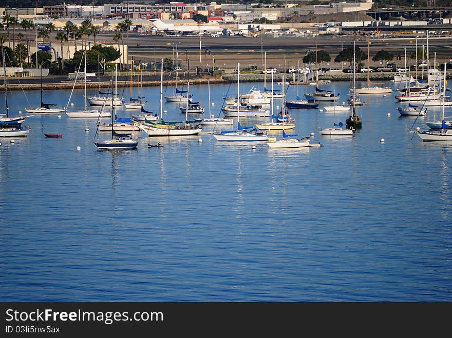 Boats in San Diego California Harbor on a calm clear day. Boats in San Diego California Harbor on a calm clear day.