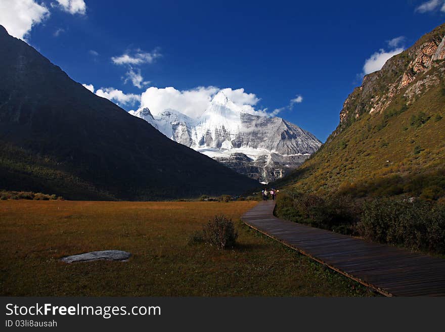 People hiking in Yading Nature Reserve. People hiking in Yading Nature Reserve