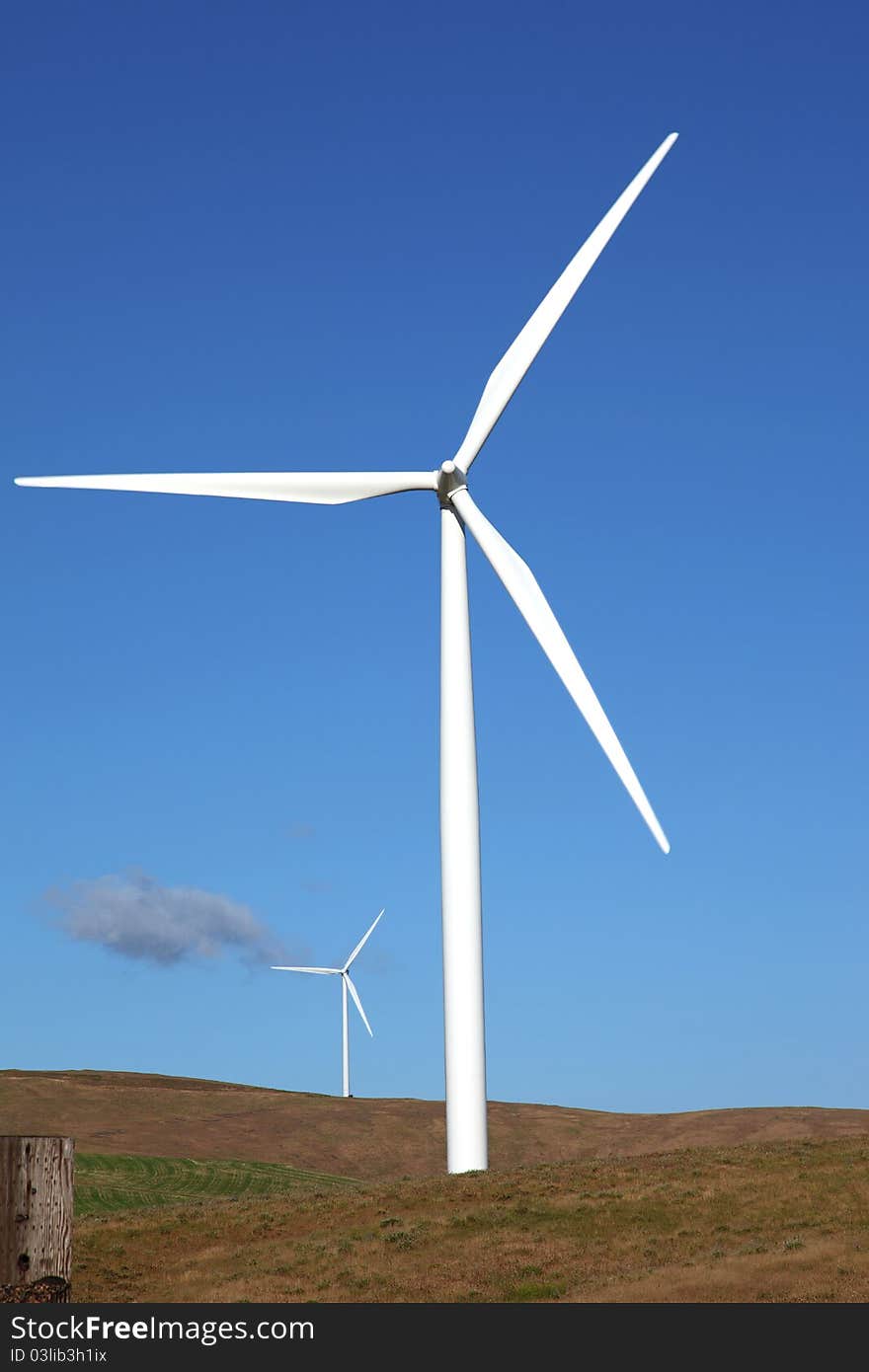 Wind turbines in a rural landscape in Washington state. Wind turbines in a rural landscape in Washington state.