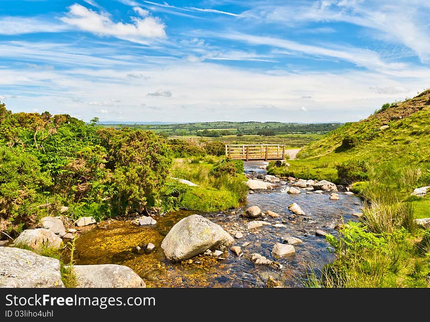 Wooden Footbridge Over A Beck