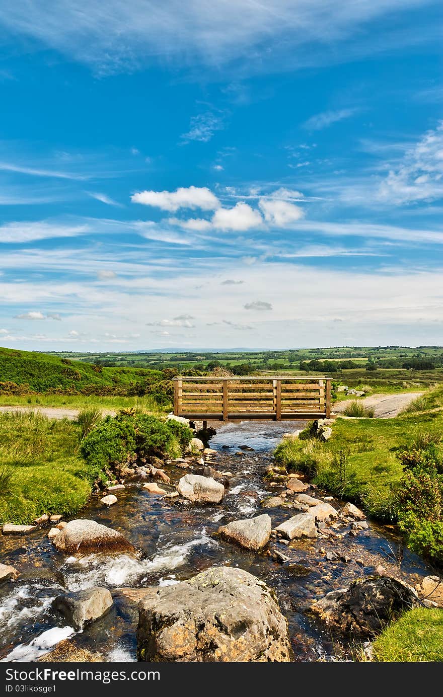 Wooden Footbridge Over A Beck