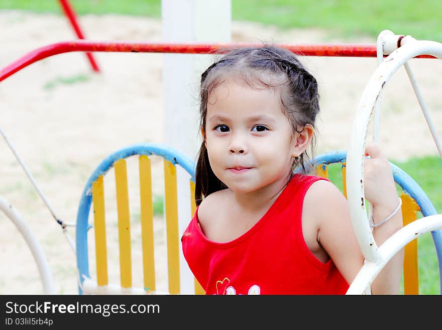 Young girl posing in park