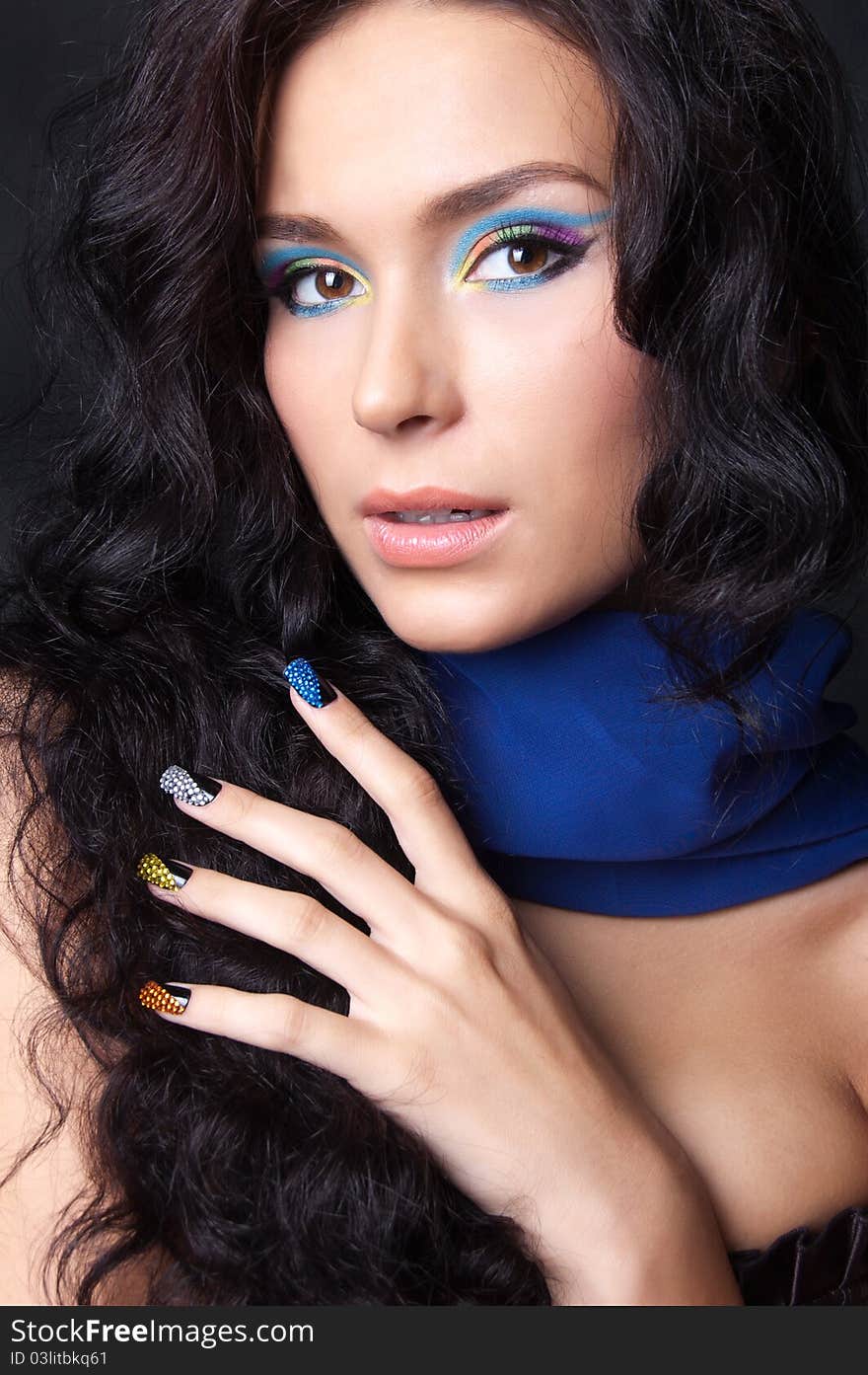 Professional colourful make-up and manicure