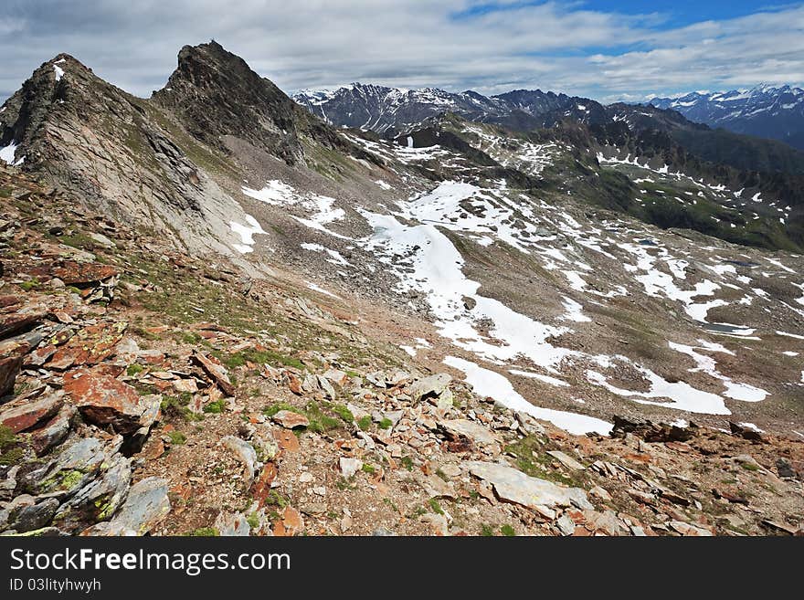 Small icy mountain lakes after a frozen night during summer. Small icy mountain lakes after a frozen night during summer