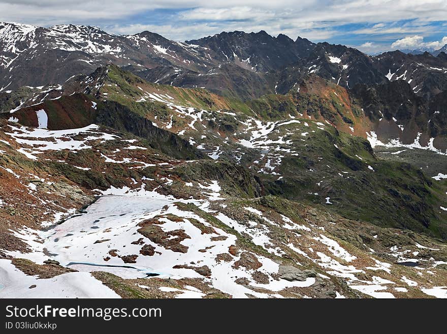 Small icy mountain lakes after a frozen night during summer. Small icy mountain lakes after a frozen night during summer