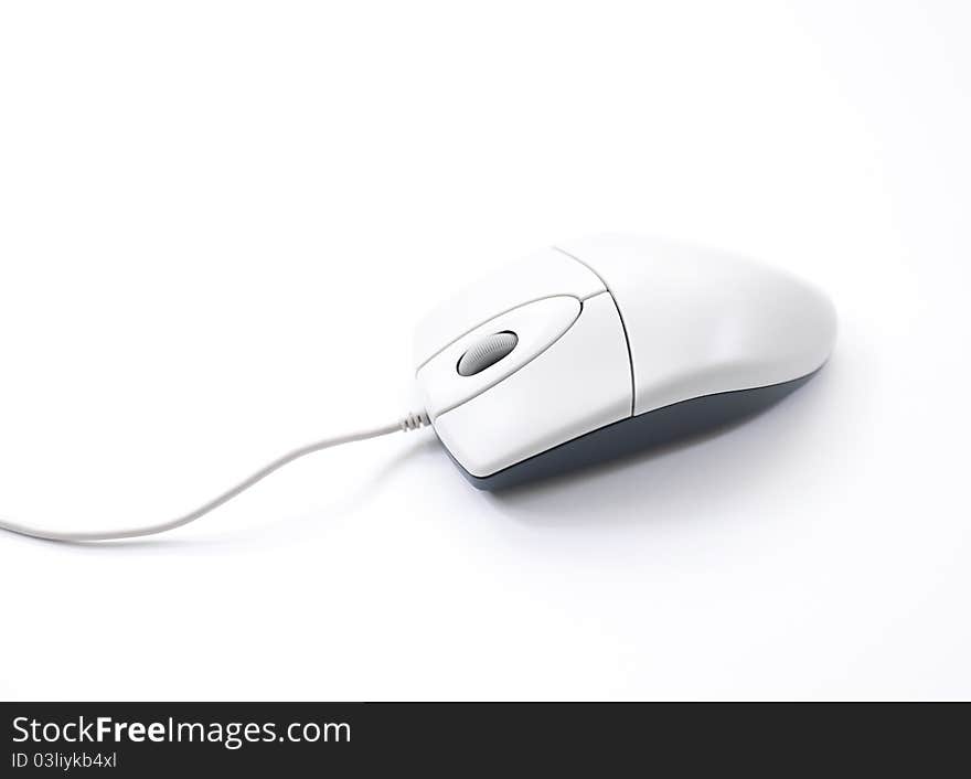 Computer mouse with cable on white background