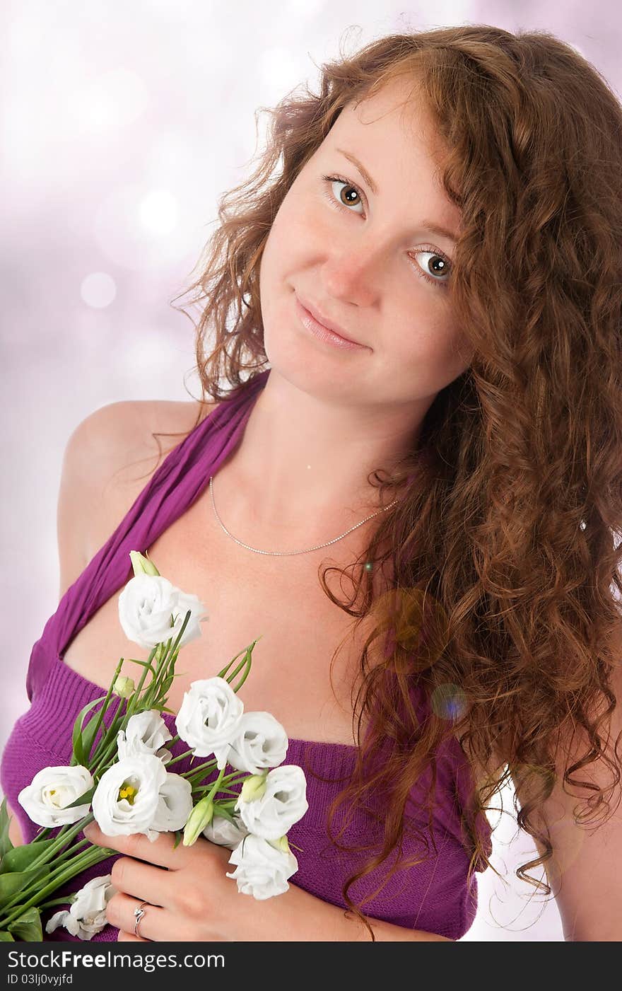 Beautiful woman with flowers isolated on white