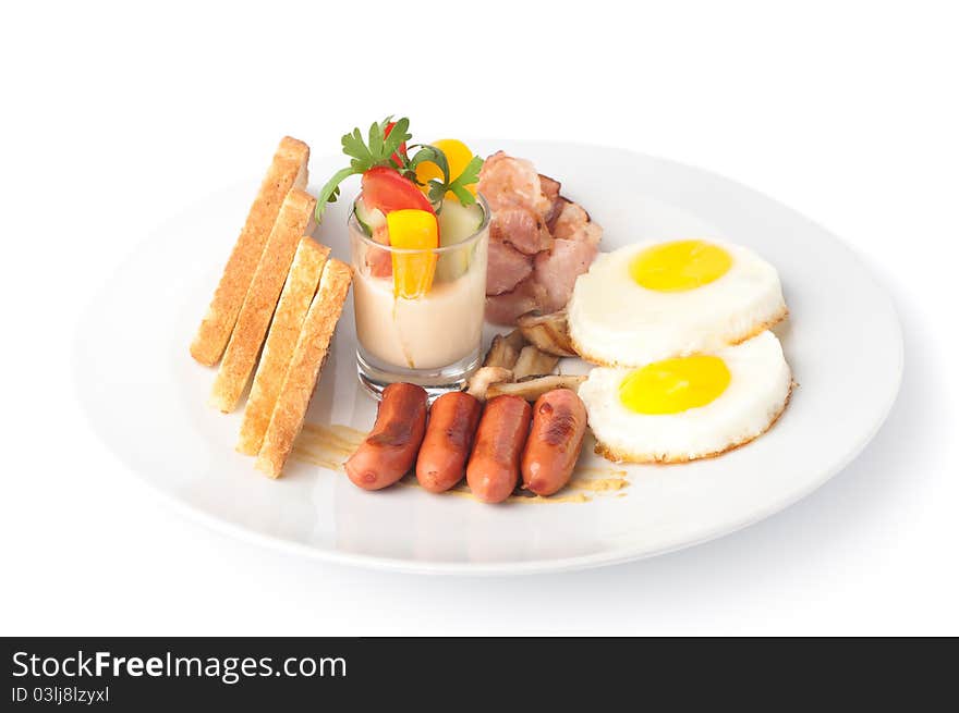 A plate with fried eggs, sausages, bread and sauce with vegetables. A plate with fried eggs, sausages, bread and sauce with vegetables