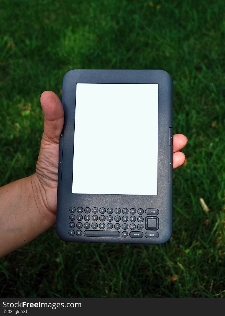 Digital book reader in hand