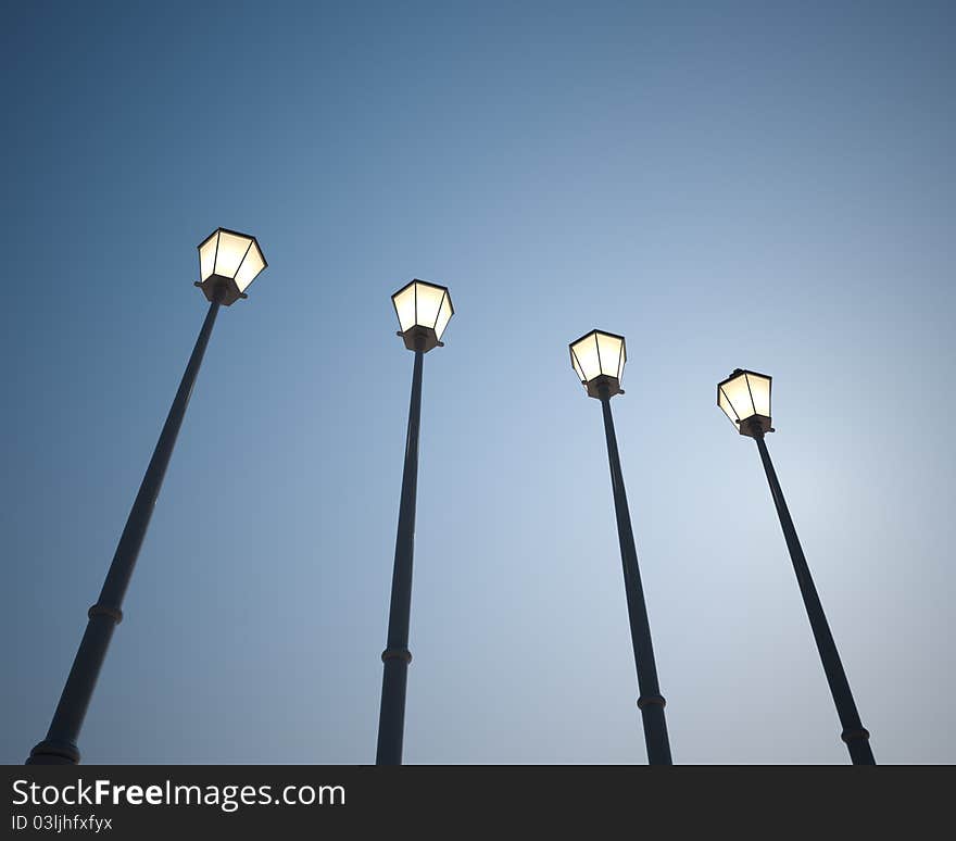 Four lanterns against the sky