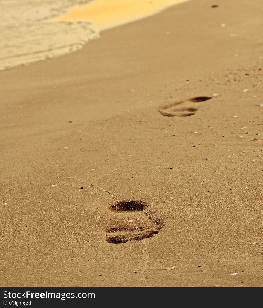 Footsteps On The Beach