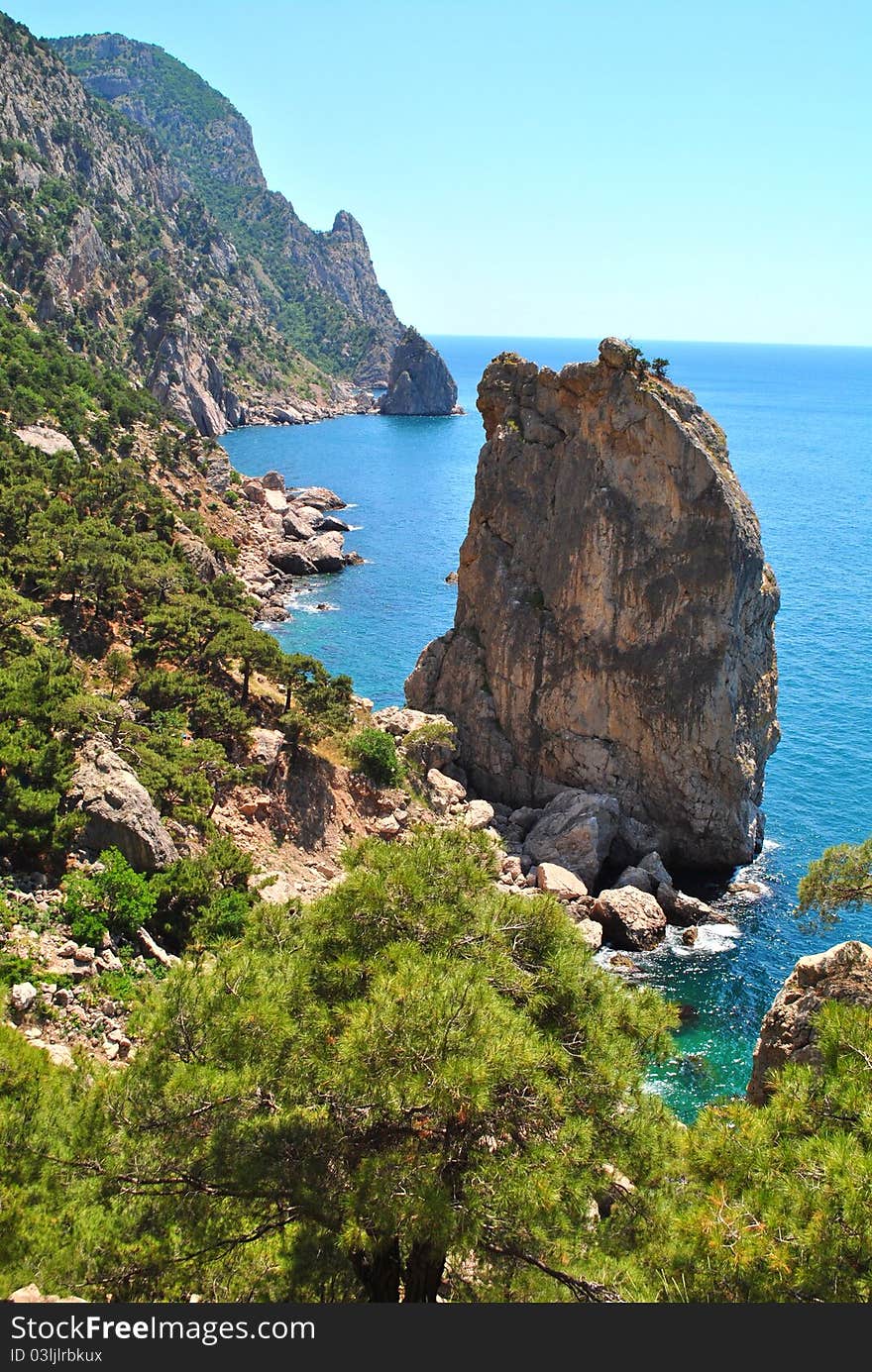 High rock and blue sea. High rock and blue sea