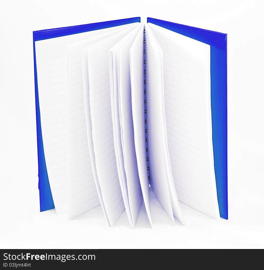 Blue notebook on white background