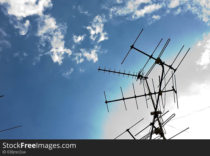 Home TV antennas mounted on sky