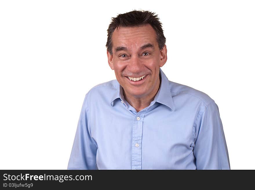 Attractive Middle Age Man in Blue Shirt Laughing with Silly Smile. Attractive Middle Age Man in Blue Shirt Laughing with Silly Smile