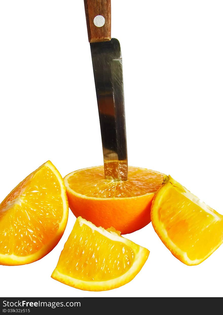 Fresh juicy orange knifed on segments on a white background