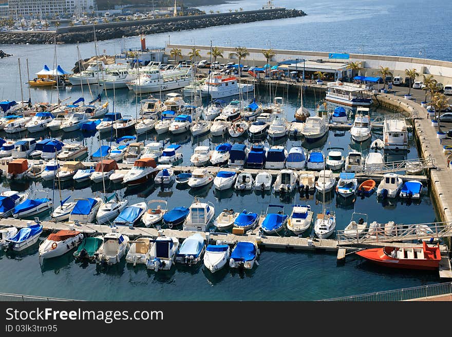 Yachts and boats in the harbor. Yachts and boats in the harbor