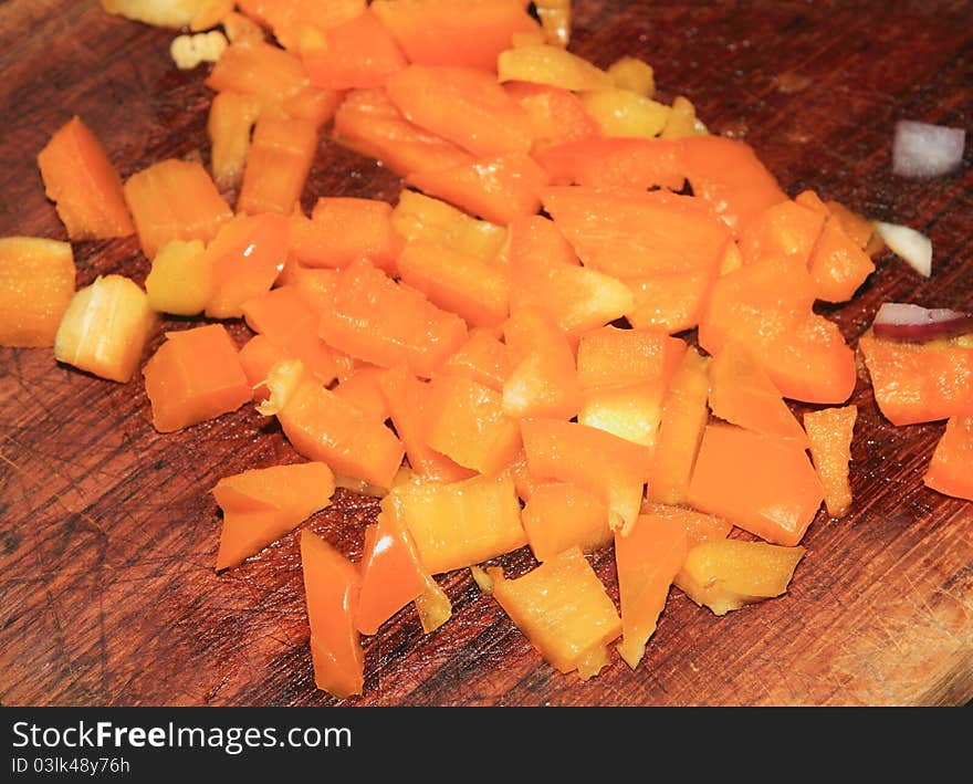 Cut peppers on a wooden surface